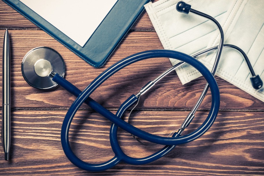 stethoscope and mask on a wooden desk 2026 09 22 14 41 33 utc